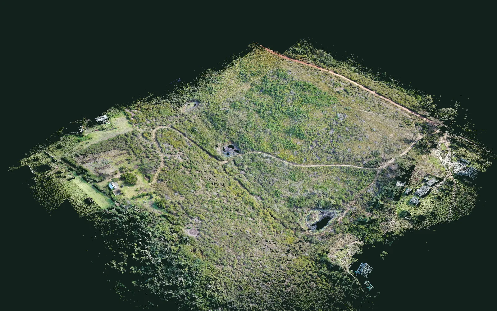 The dense point cloud of the property seen from an angle: millions of coloured measured points describing the surface, buildings and vegetation.